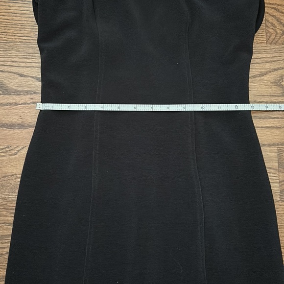 Black evening dress. Slit on left front. Strappy back with silver buckles. - Picture 7 of 8
